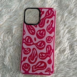Pink smiley face iPhone 12 Case
